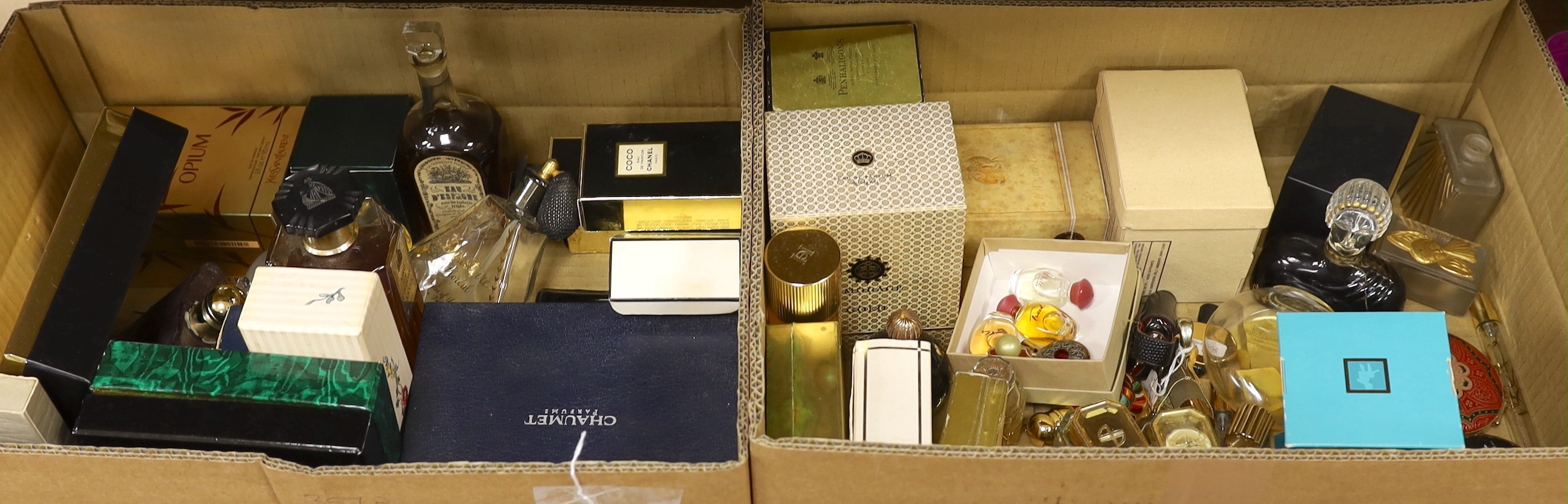 An assorted collection of mixed perfumes (some used): Lavin, Yves Saint Laurent, Chanel, Jean Paton, Jean Paul Gaultier, etc, (in two large boxes)
